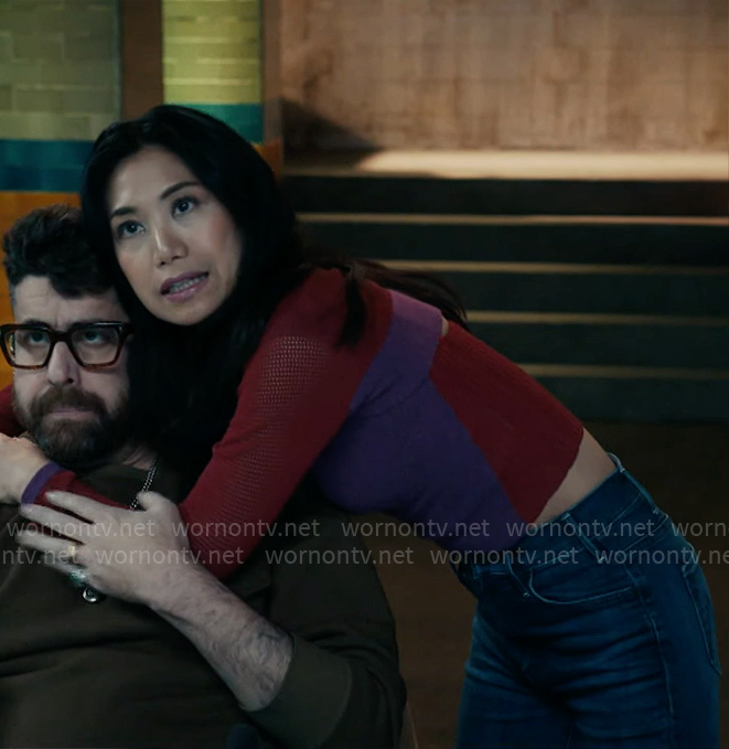 Mel's purple and red knit top on The Equalizer