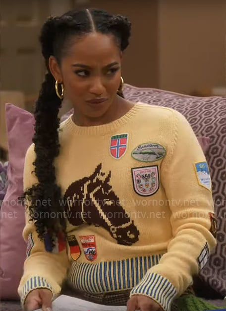 Nina's yellow horse sweater with patches on Poppas House