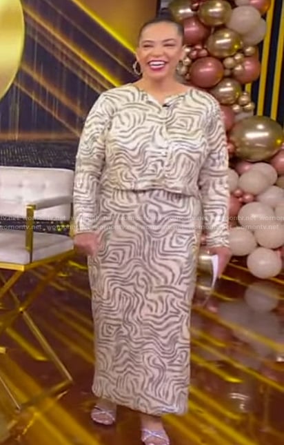 Quiana Burns's metallic cropped jacket and skirt on Tamron Hall Show