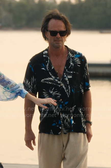 Rick's black and blue leaf print shirt on The White Lotus