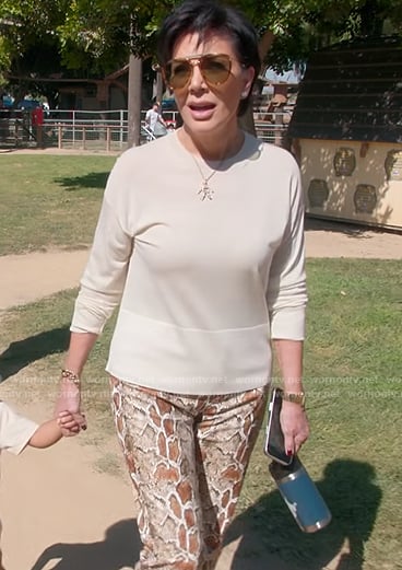 Kris's snake skin print pants on The Kardashians