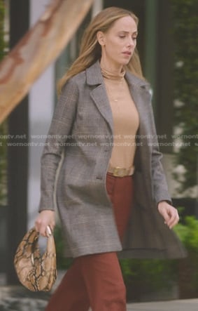 Teddy's beige mock neck jersey top and snakeskin bag on Greys Anatomy