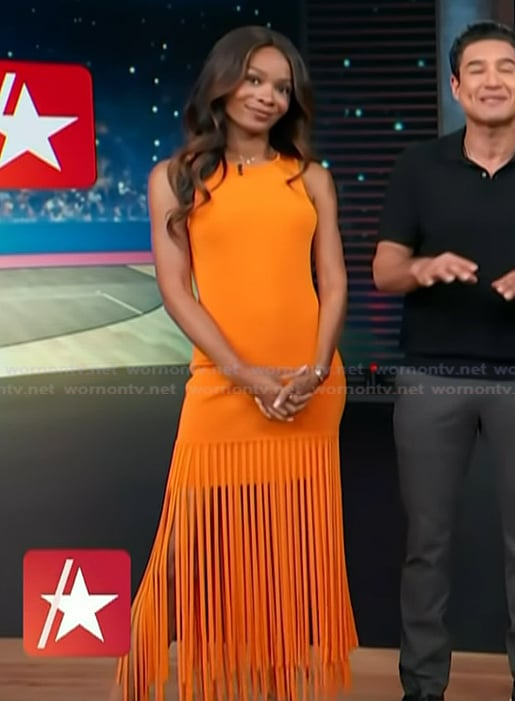Zuri's orange sleeveless fringe dress on Access Hollywood