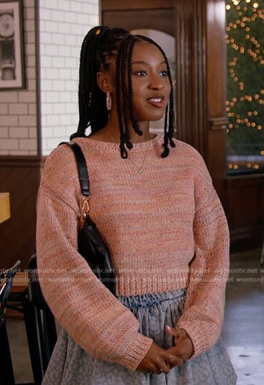 Amina's orange knit sweater and blue bubble skirt on All American