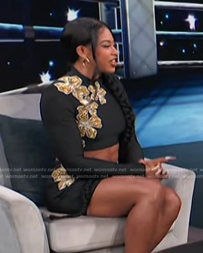 Bianca Belair's black embellished crop top and skirt on Access Hollywood