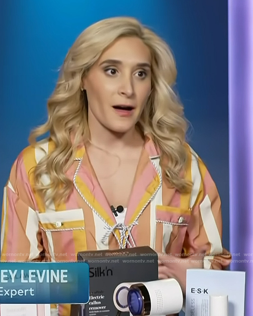 Brittney Levine's striped blouse on Access Hollywood
