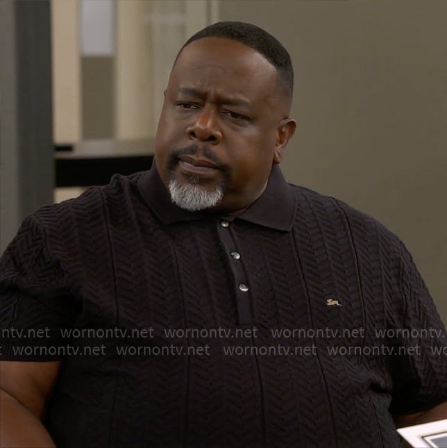 Calvin's black chevron knit polo on The Neighborhood