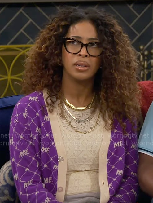 Courtney's purple ME monogram cardigan on The Neighborhood