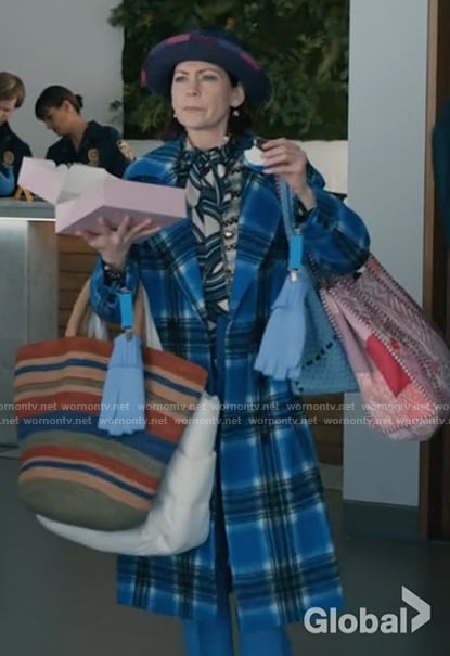 Elsbeth's blue plaid coat on Elsbeth