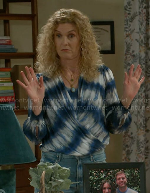 Jan's blue tie-dye blouse on Beyond the Gates