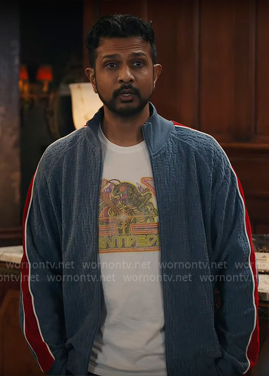 Jay's blue textured jacket with red striped sleeves on Ghosts