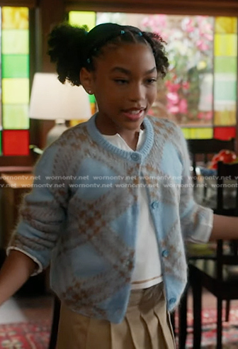 Mara's blue plaid cardigan and pleated skirt on 9-1-1