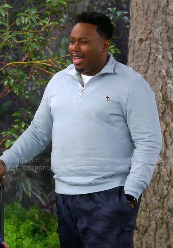 Marty's light blue zebra sweatshirt on The Neighborhood