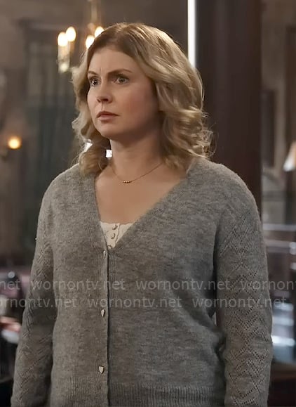 Sam's grey cardigan with heart buttons on Ghosts