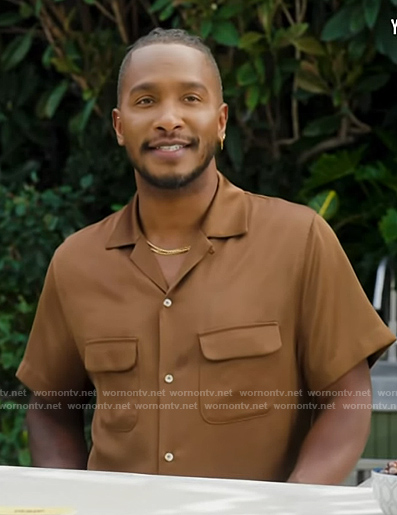 Scott's brown utility shirt on Access Hollywood