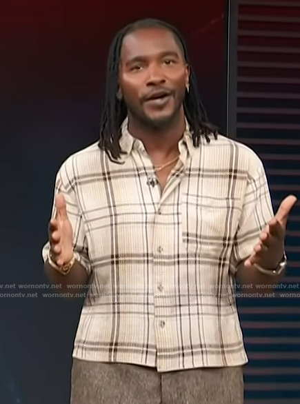 Scott's plaid shirt on Access Hollywood