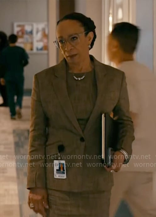 Sharon's textured print blazer and dress on Chicago Med