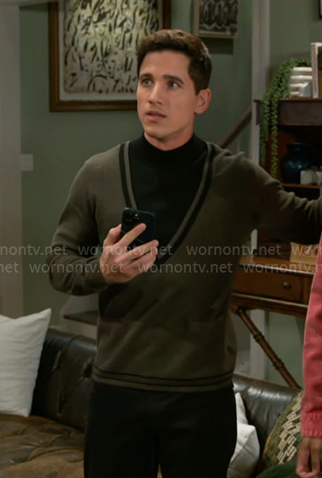Smitty's green and black sweater on Beyond the Gates