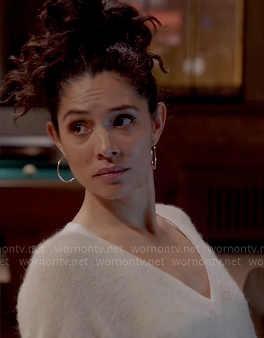 Stella's white v-neck fluffy sweater on Chicago Fire