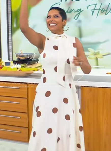 Tamron's white polka dot print dress on Tamron Hall Show