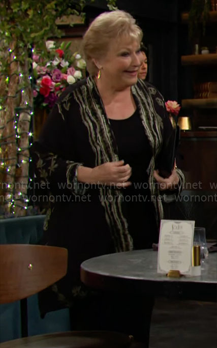 Traci's black butterfly print jacket on The Young and the Restless