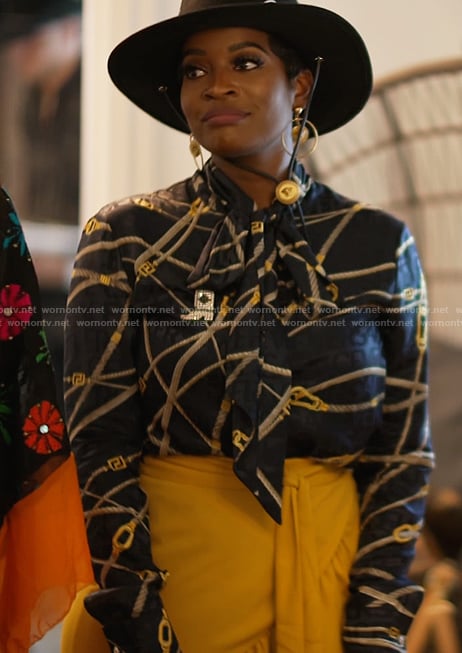 Shamea's black printed tie neck blouse on The Real Housewives of Atlanta
