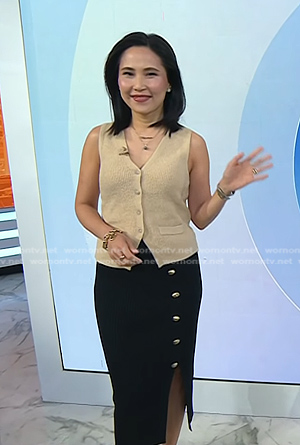 Vicky's beige knit vest and black button skirt on Today