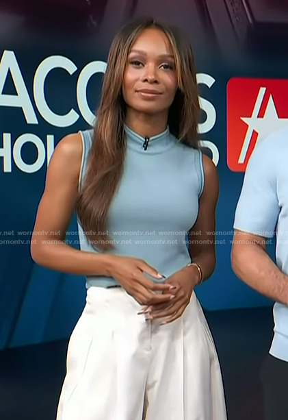 Zuri's blue mock neck top on Access Hollywood