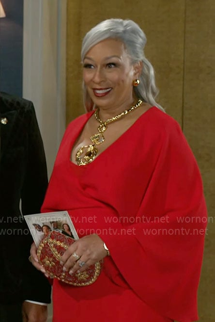 Anita's red wide sleeve evening gown on Beyond the Gates