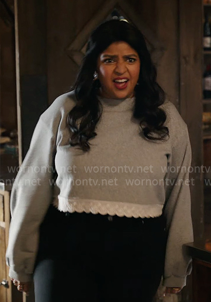 Bela's grey lace-trim sweatshirt on Ghosts