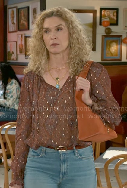 Jan's printed blouse and orange suede bag on Beyond the Gates