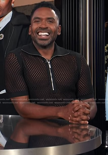 Justin's black mesh half zip polo on E! News