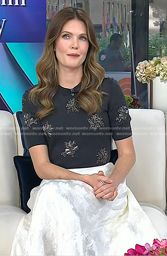 Meghann Fahy's grey embellished sweater and white skirt on Today
