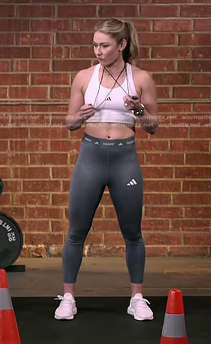 Mikaela Shiffrin's white sports bra and leggings on The Voice