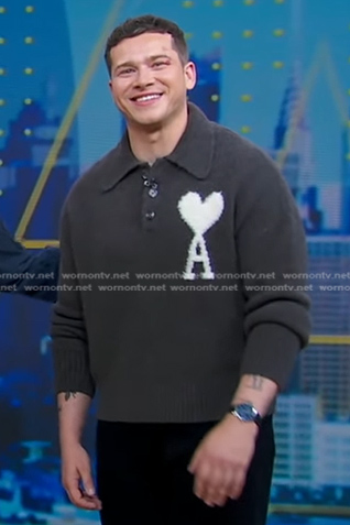 Oliver Stark's grey logo print polo sweater on Good Morning America