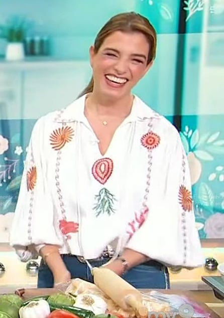 Pati Jinich's white embroidered top on Sherri