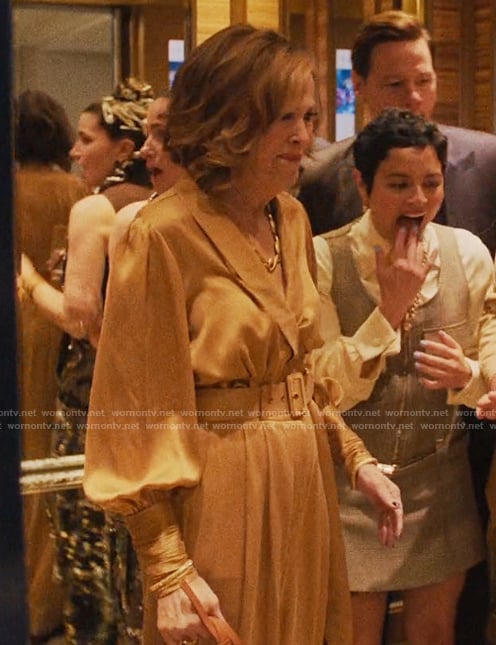 Patty's beige satin wrap top and belted pants on The Studio