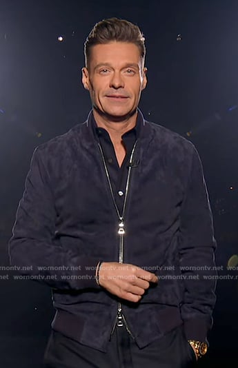 Ryan Seacrest's navy suede bomber jacket on American Idol