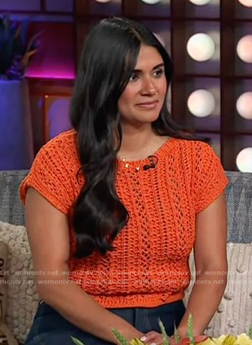 Sam's orange knit top on The Kelly Clarkson Show