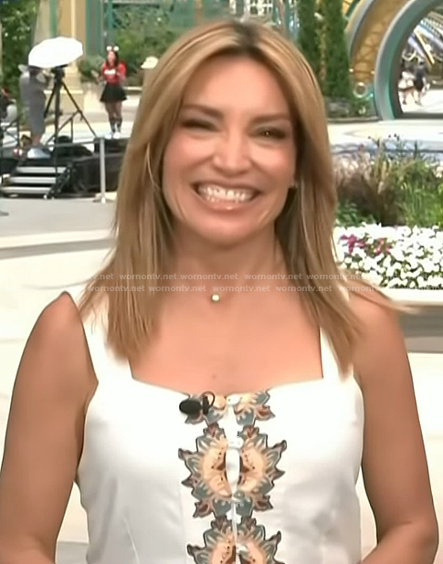 Kit's white floral print linen dress on Access Hollywood