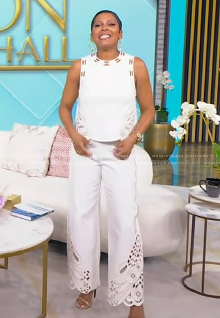 Tamron's white embroidered top and pants on Tamron Hall Show