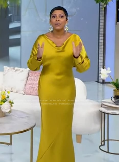 Tamron's yellow satin cowl neck dress on Tamron Hall Show