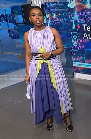 Zinhle’s purple pleated dress and belt on NBC News Daily