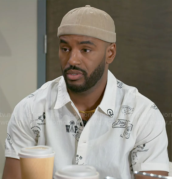 Andre's white printed shirt on Beyond the Gates