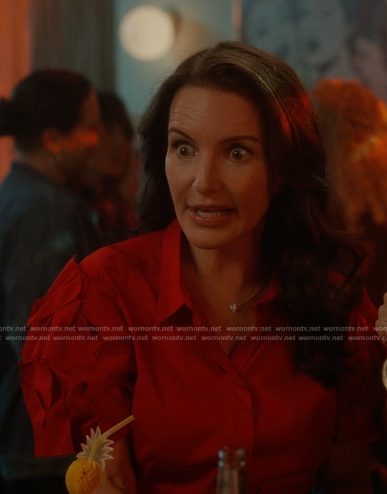 Charlotte's red ruffle sleeve top on And Just Like That