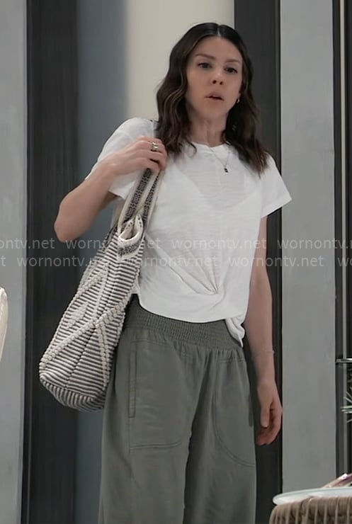 Kristina's white twist hem tee and green pants on General Hospital