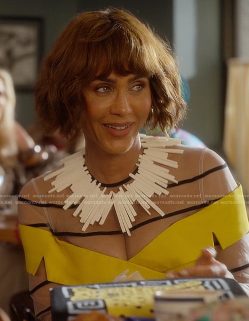Lisa's striped sheer coat on And Just Like That
