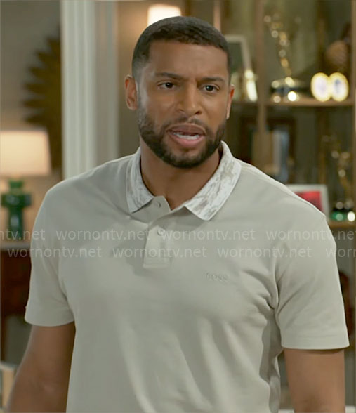 Martin's beige polo shirt with printed collar on Beyond the Gates