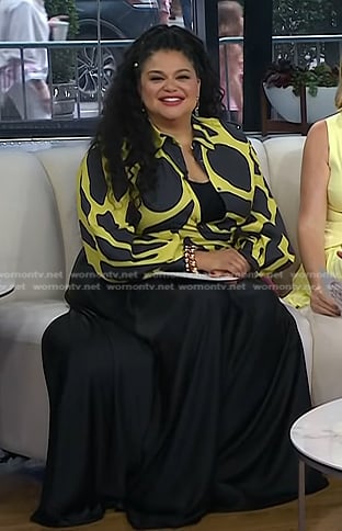 Michelle Buteau's yellow print blouse and black skirt on Today