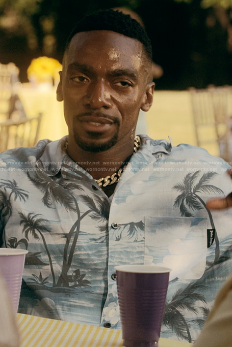 Pastor Zeke's blue tropical print shirt on the Chi